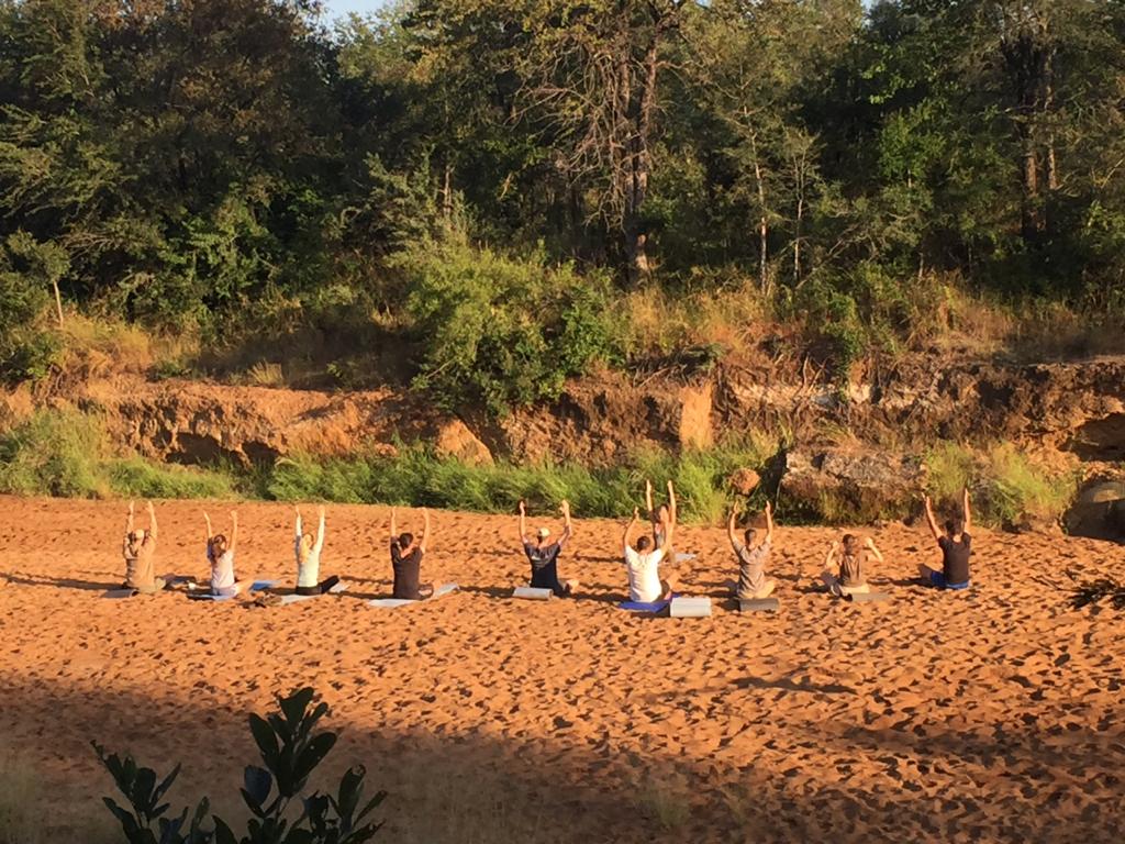 Yoga session in a dry riverbed
