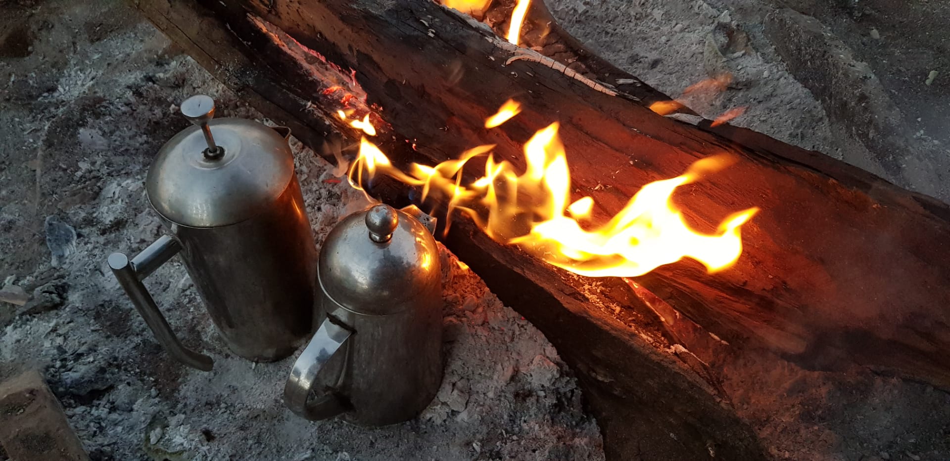 Early morning coffee on a rustic campfire